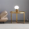 Modern coffee table; Golden metal frame with round tempered glass tabletop